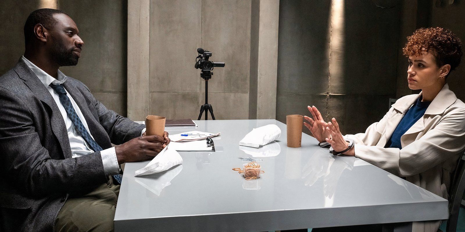 Omar Sy interrogates Nathalie Emmanuel in The Killer still-1