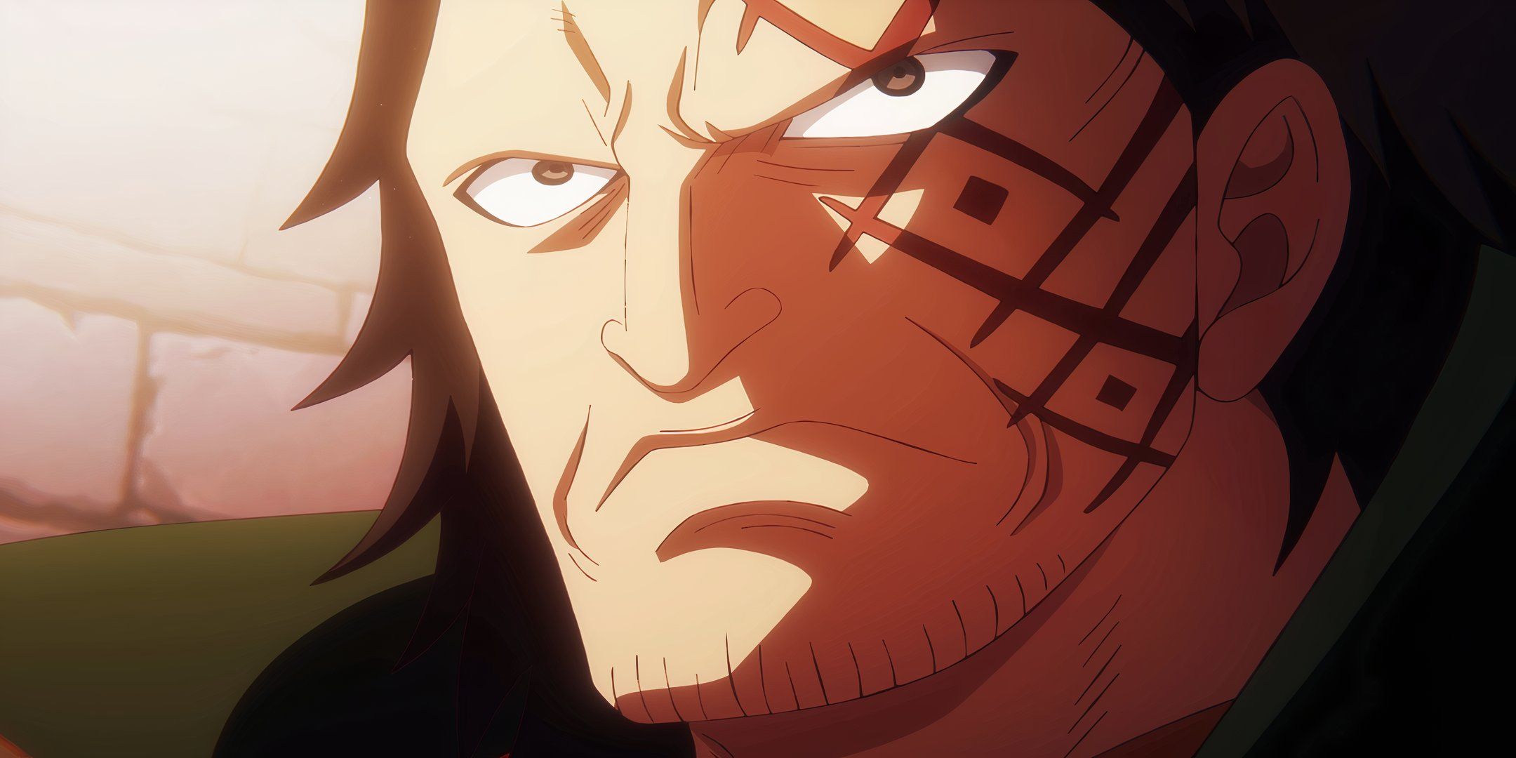 Dragon looks angry with a tattoo on his face in One Piece episode 1116