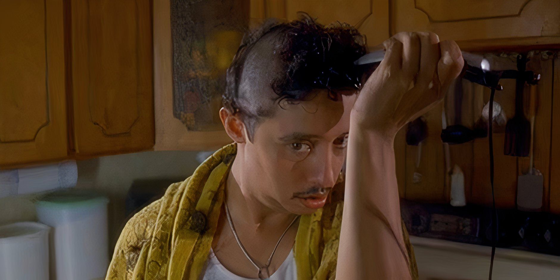 Pedro shaving his head in his kitchen in Napoleon Dynamite