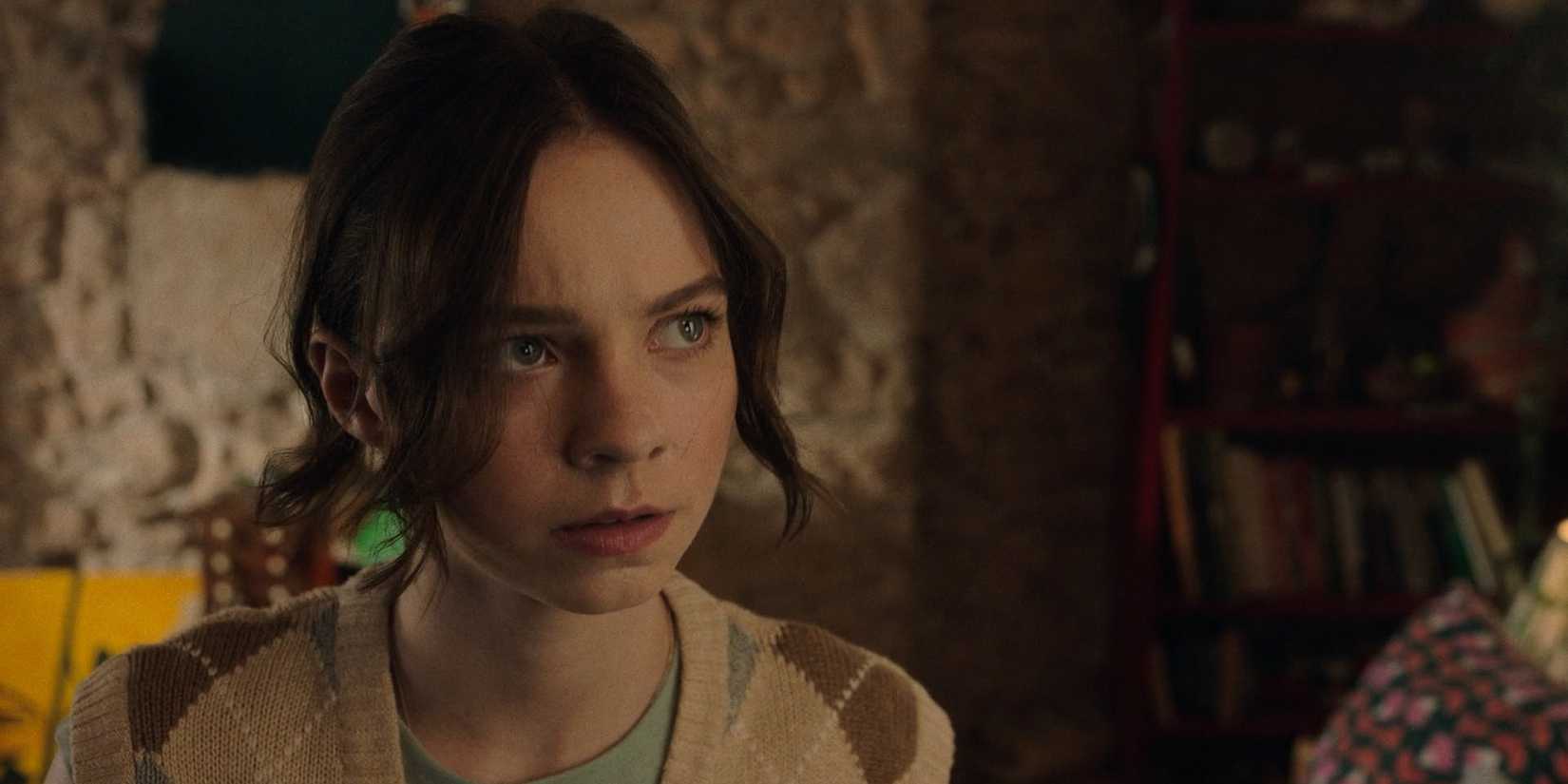 Pippa Fitz-Amobi (Emma Myers) looking pensive in A Good Girl's Guide to Murder