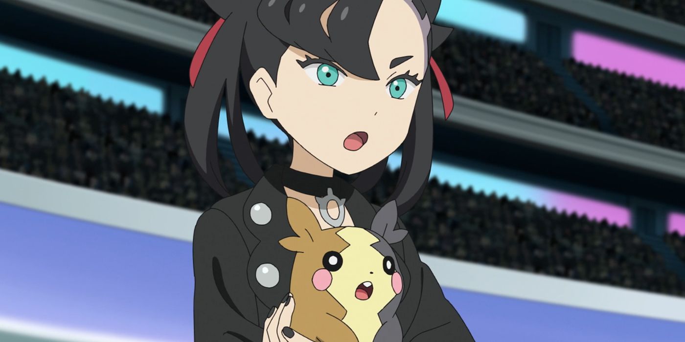 Marnie holding her Morpeko in a stadium.