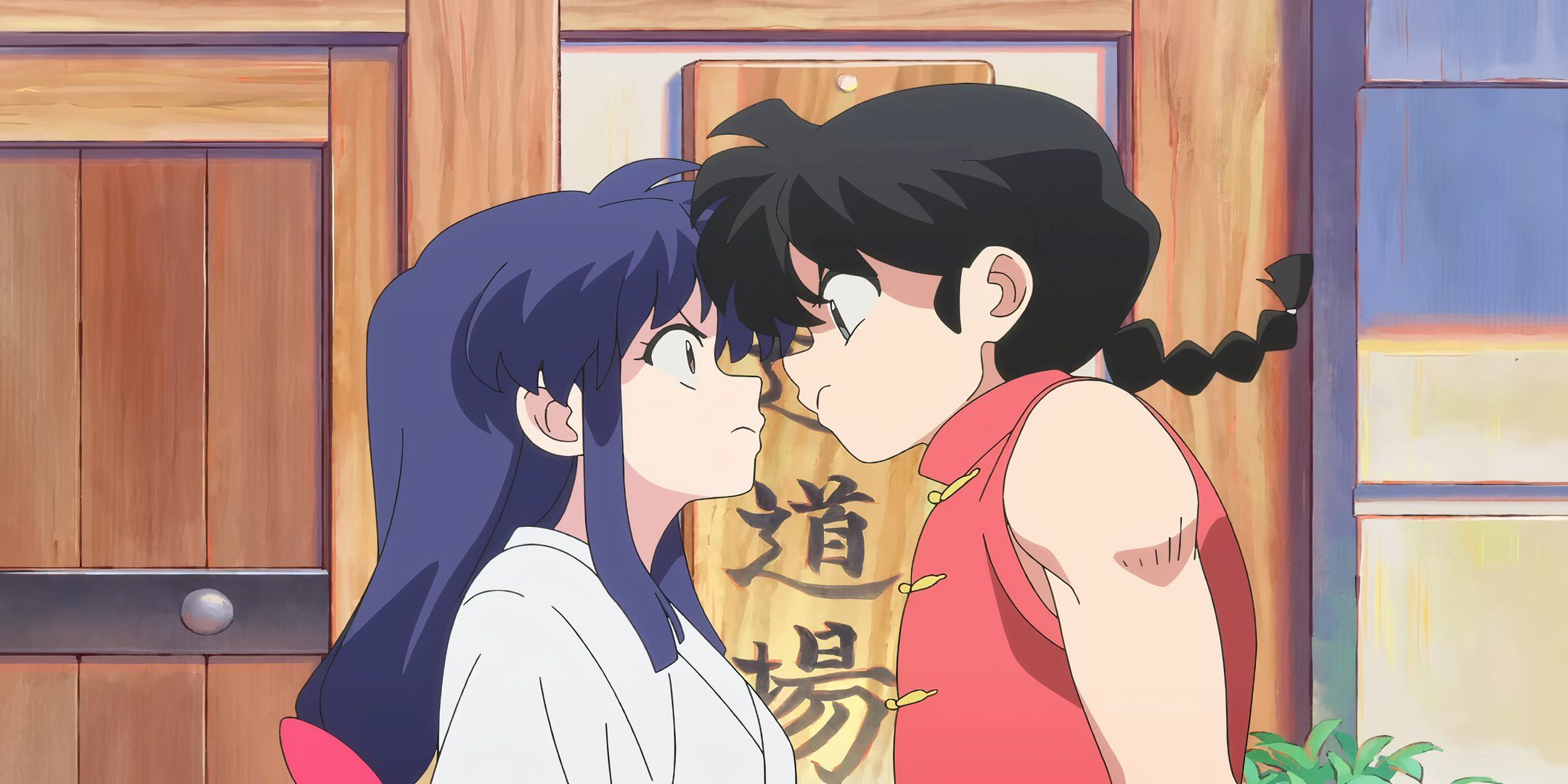 Ranma e Akane se entreolhando irritados no remake