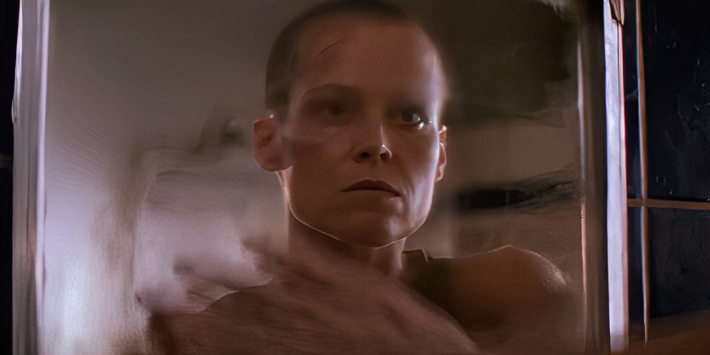 Ripley looking at herself in a mirror in Alien 3