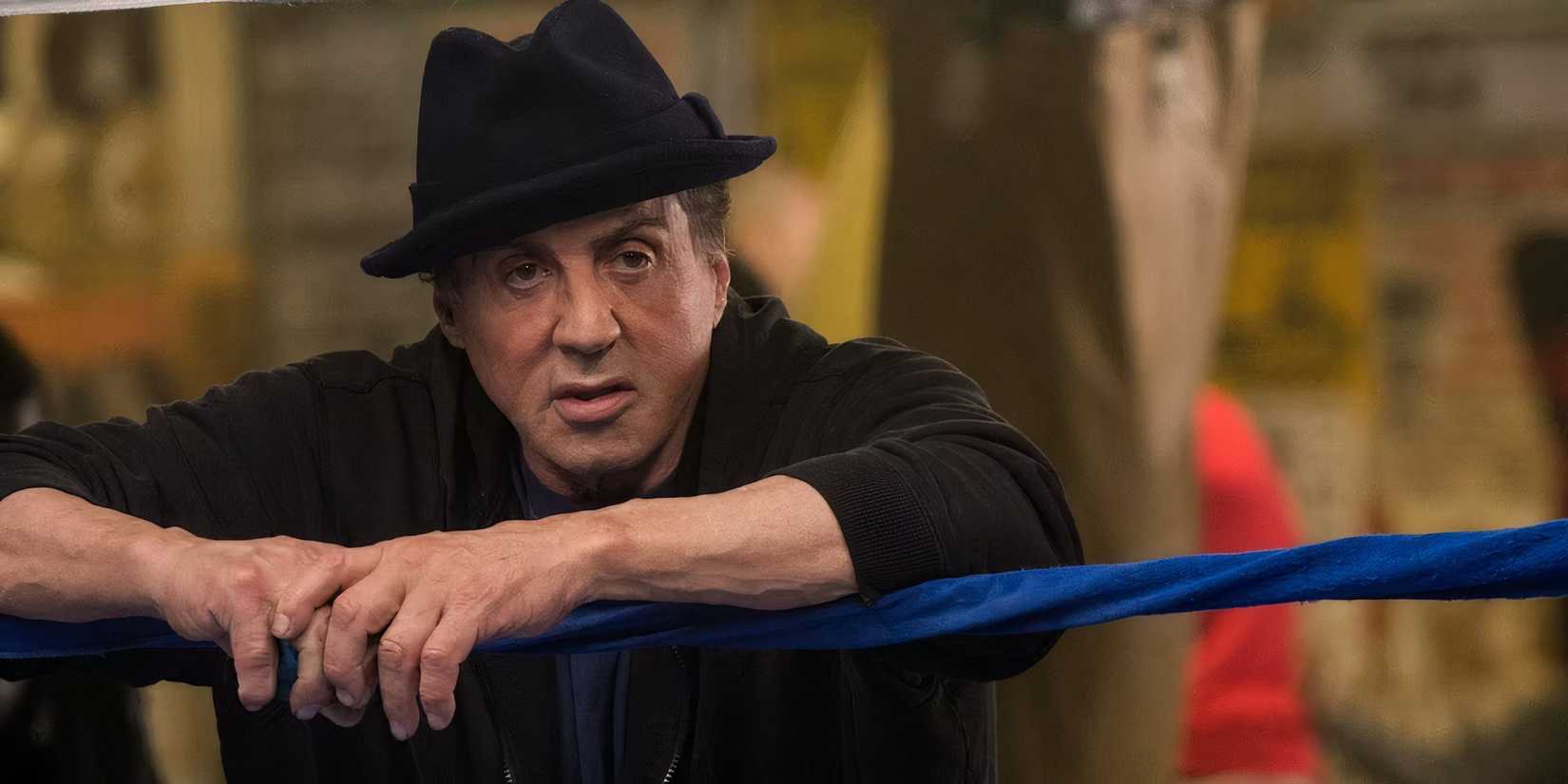 Sylvester Stallone as Rocky Balboa, leaning on the ropes in Creed