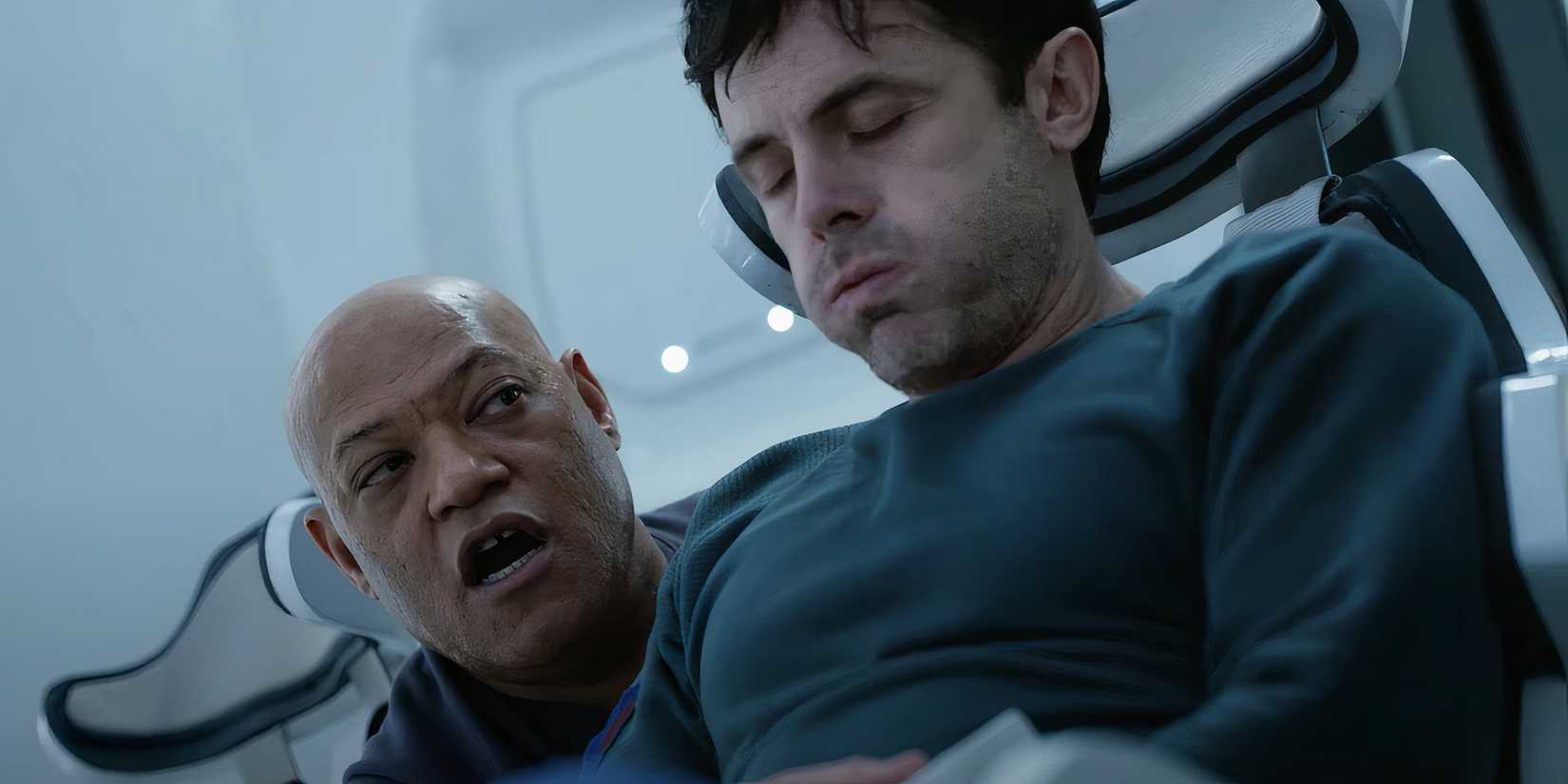 Captain Franks (Laurence Fishburne) talking to John (Casey Affleck) as he takes deep breaths in Slingshot.