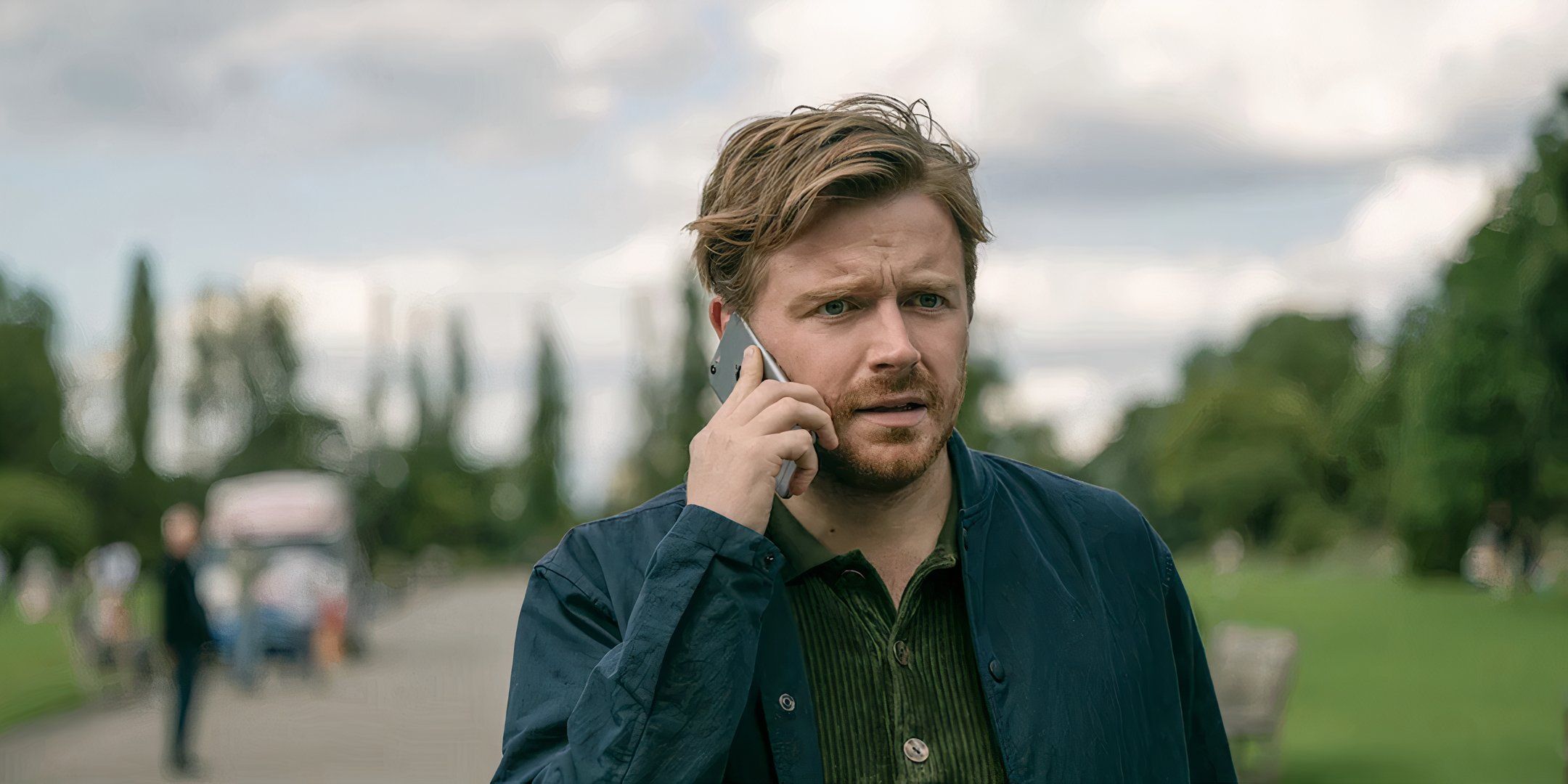 River Cartwright (Jack Lowden) receives a disturbing phone call in 