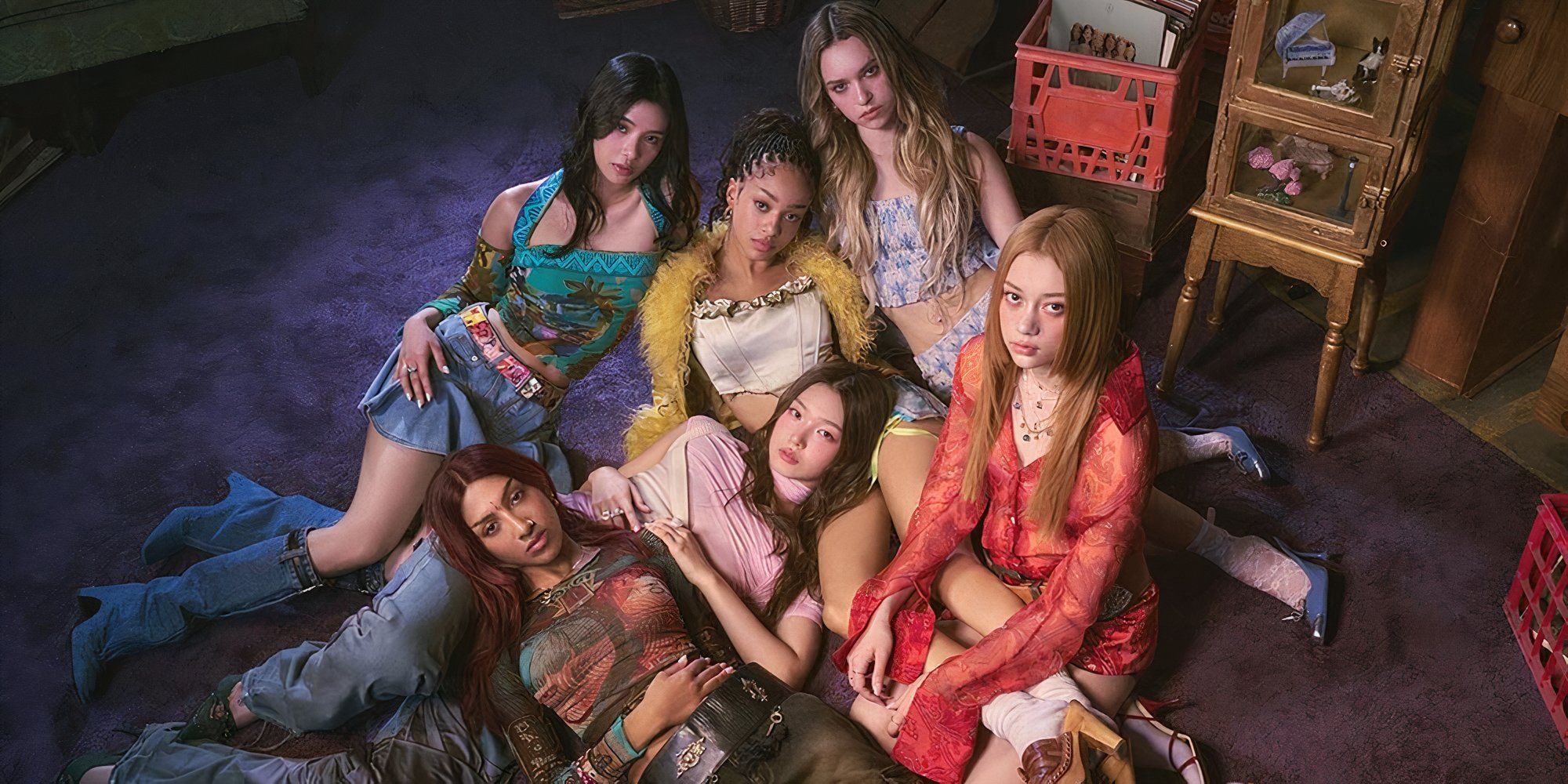 Pop Star Academy: KATSEYE, with four girls seated and two lying on each other