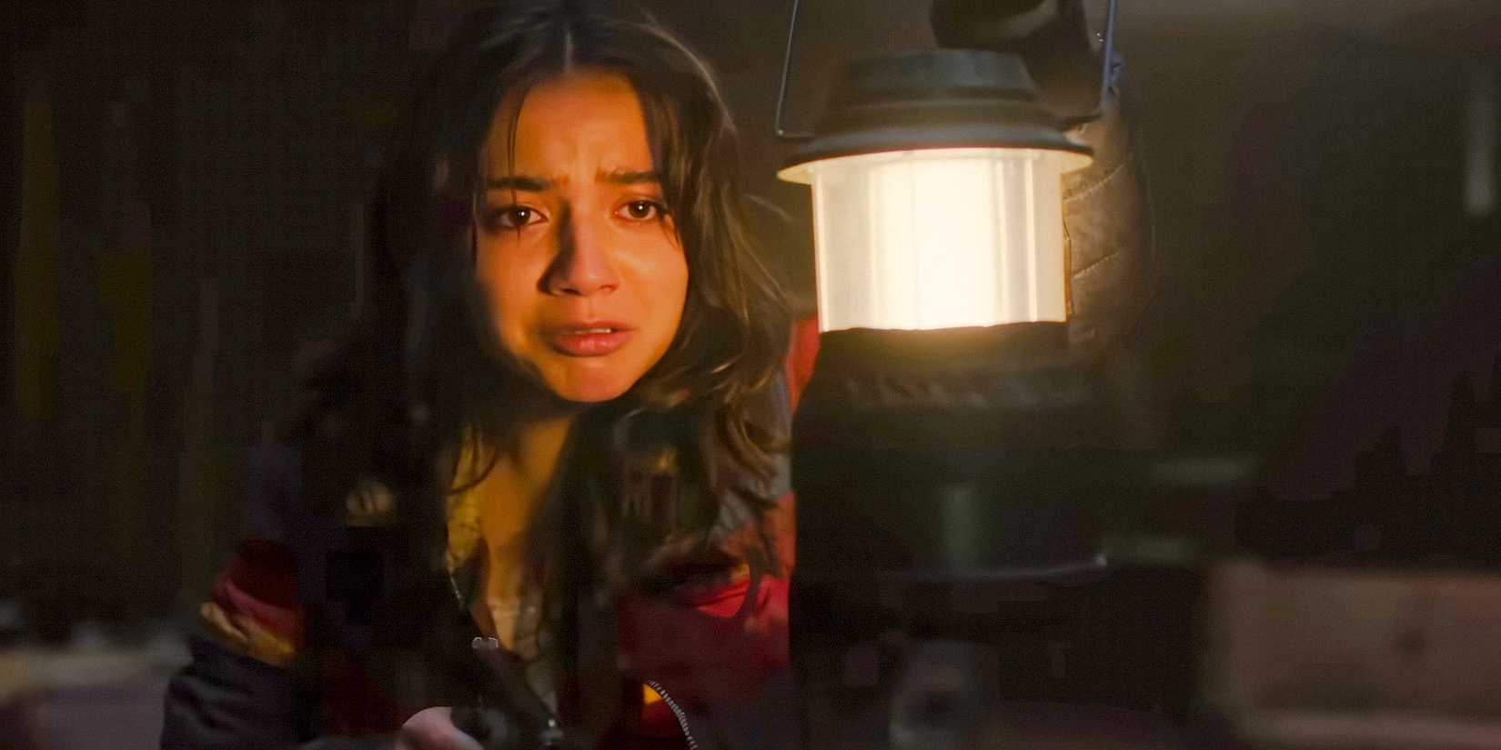 Dina (Isabela Merced) holding a flashlight in The Last of Us Season 2.