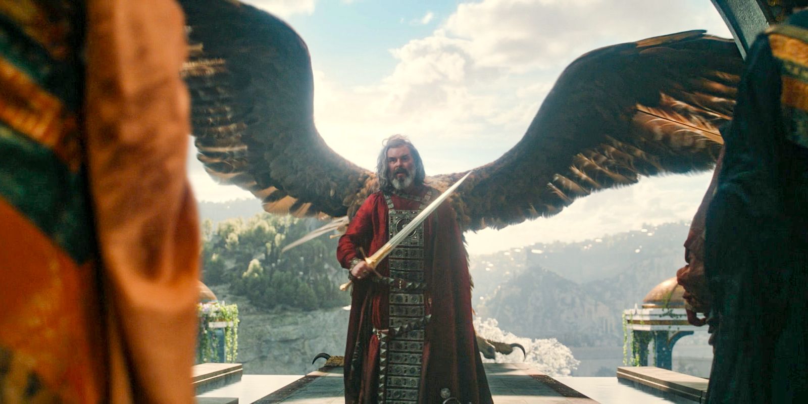 Pharazôn (Trystan Gravelle) wielding a sword, and a great eagle in The Lord of the Rings: The Rings of Power Season 2 Episode 3