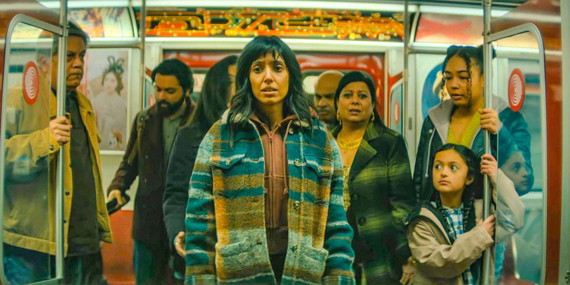 A worried Lila (Ritu Arya) gets her family to safety on the train in The Umbrella Academy.