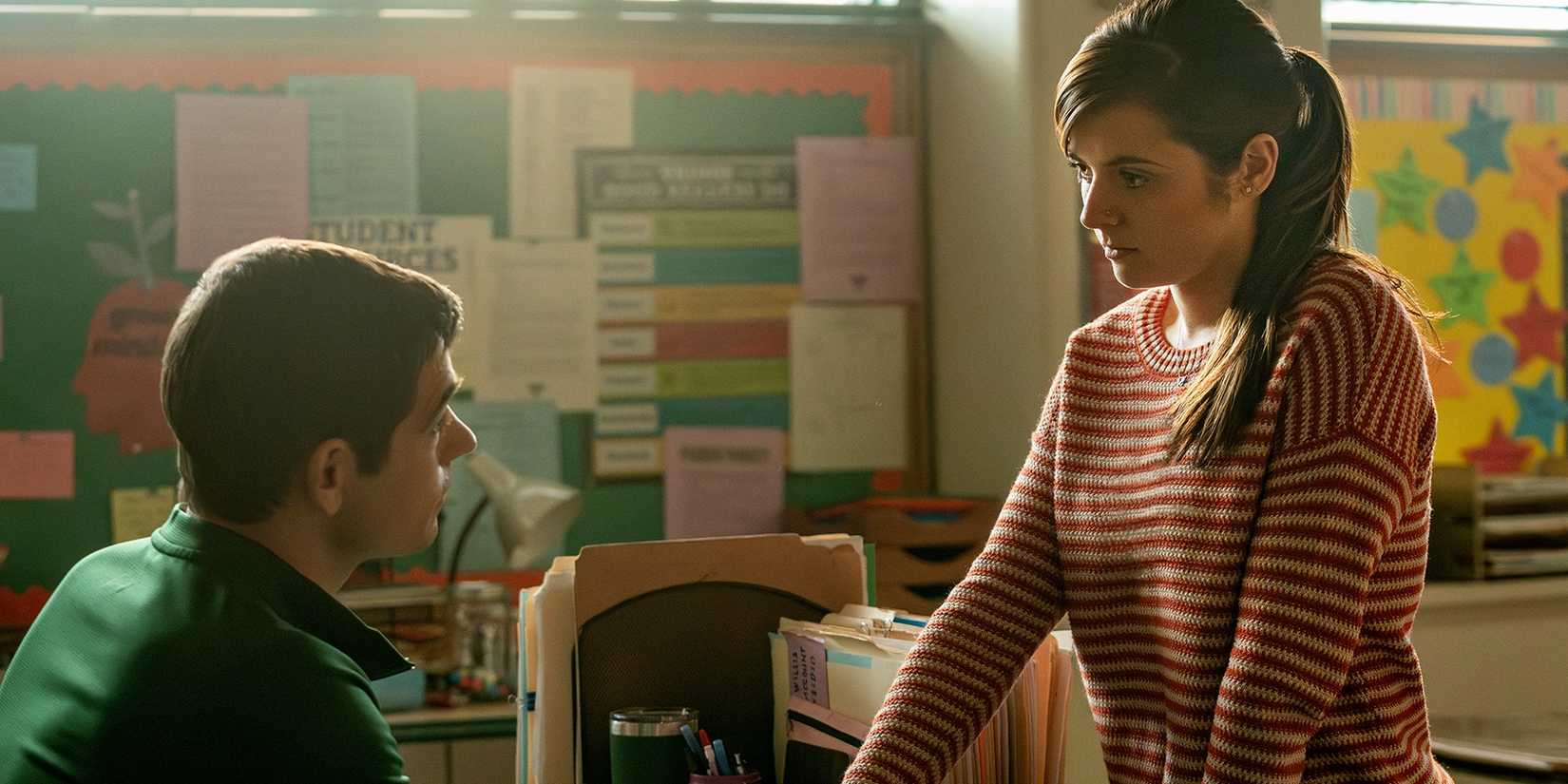 Maggie (Gabrielle Creevy) talking to Aaron (Jason Knodel) in a classroom in Three Women.