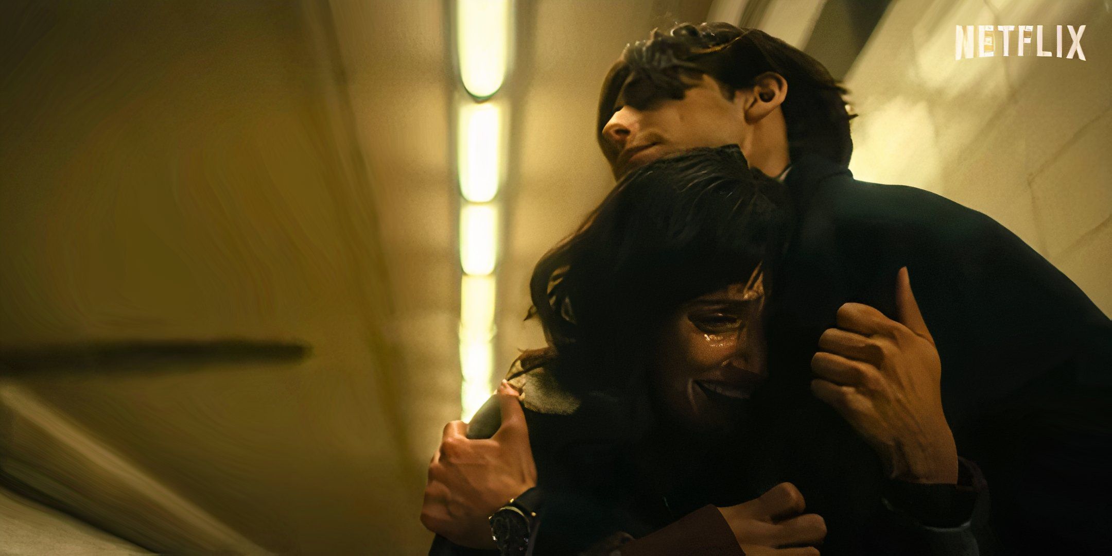 Number Five (Aidan Gallagher) comforts a distressed Lila (Ritu Arya) in the Umbrella Academy season 4 trailer.