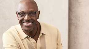 The Golden bachelorette - Charles K leaning forward and smiling