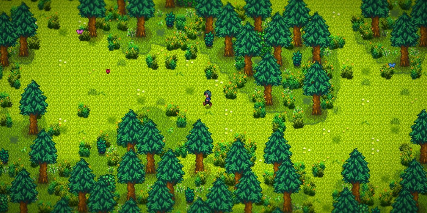 A player running through a forest in Stardew Valley