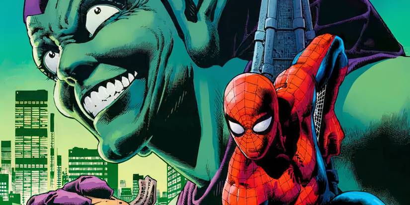Spider-Man in front of Green Goblin's giant head in Marvel comics