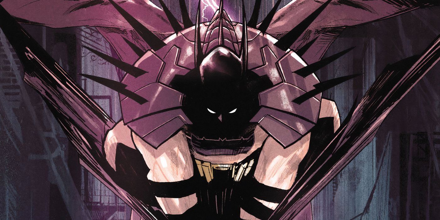 Absolute Batman crouches in the shadows, showcasing his spike-covered shoulder pads.