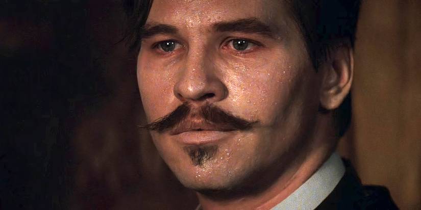 Val Kilmer as Doc Holliday drenched in sweat in Tombstone
