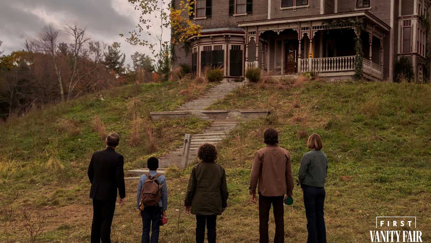 First-look image of the upcoming 'Salem's Lot movie. 5 of the main characters face the eerie home that sits on top of this hill.