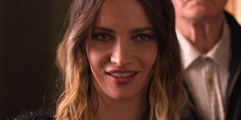 Vicky Christmas (Talulah Riley) smiling at someone in Father Christmas is Back.