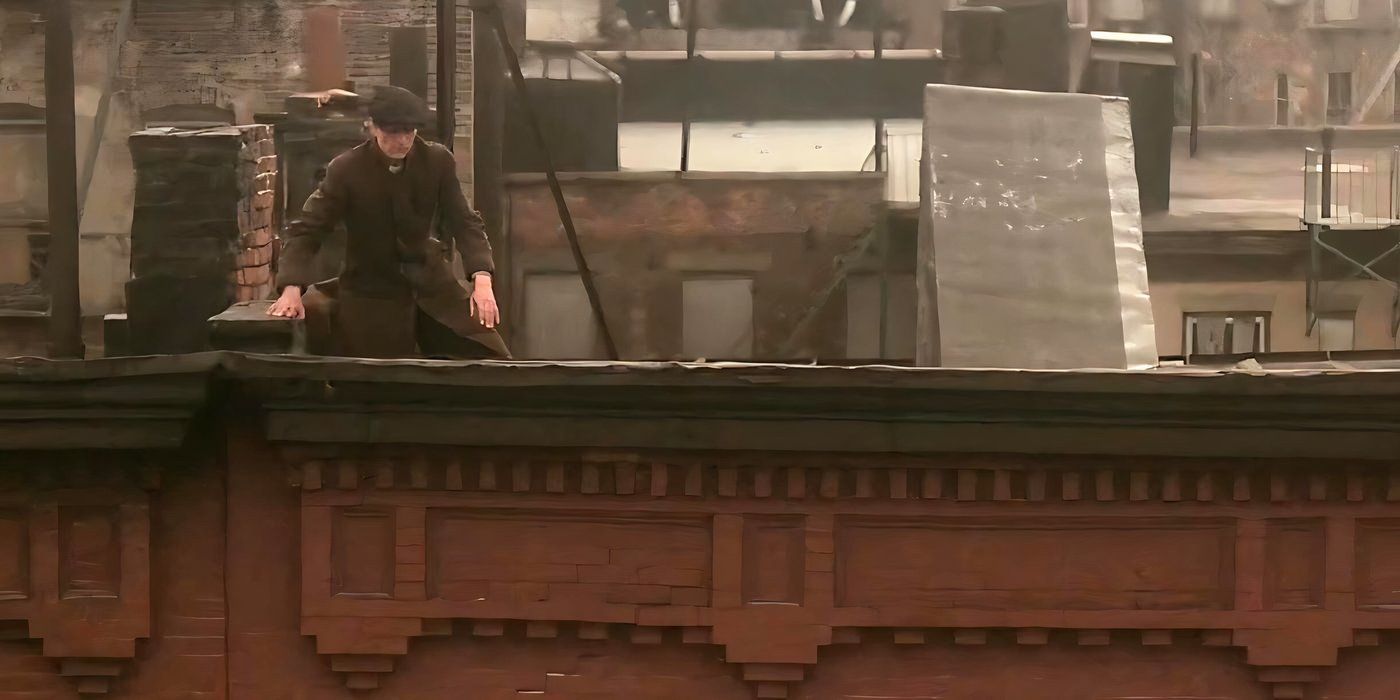Vito Corleone (Robert De Niro) on a rooftop in NYC in The Godfather Part II