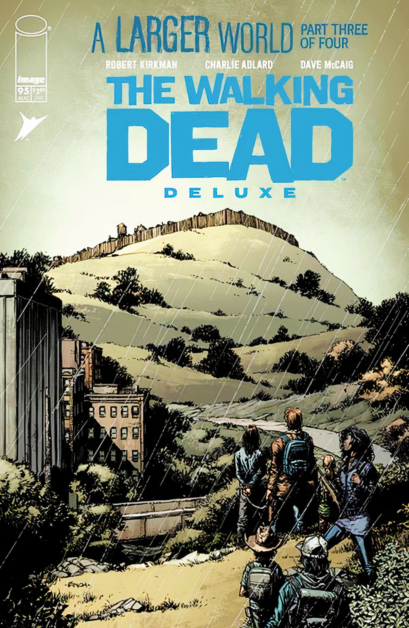 Capa de Walking Dead Deluxe #95, os sobreviventes caminhando sob a chuva sobre uma colina em direção a uma cidade ocupada