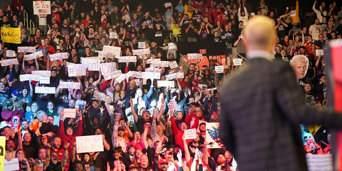 Cody Rhodes enters the ring to We Want Cody signs on the run up to WreslteMania 40