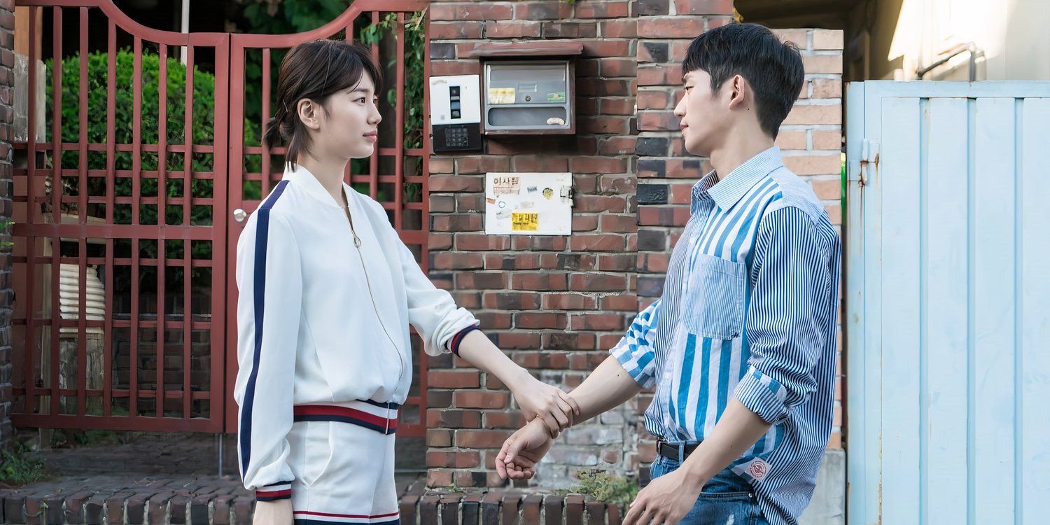 While You Were Sleeping's Nam Hong-joo takes Han Woo-tak's arm.