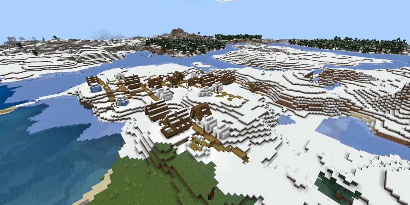 Vista de uma vila em um bioma de neve no Winder Wanderland Minecraft PE Seed.