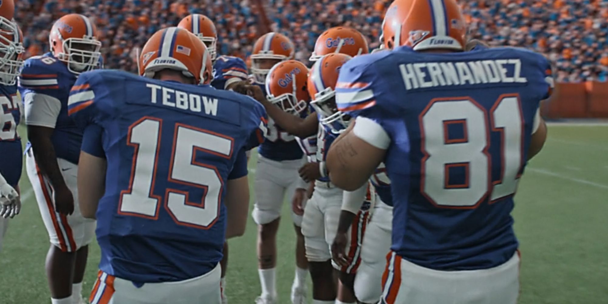 Patrick Schwarzenegger in the huddle as Tim Tebow with Josh Rivera as Aaron Hernandez in American Sports Story