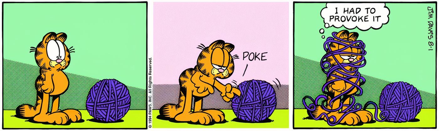 Garfield playing with a ball of yarn.