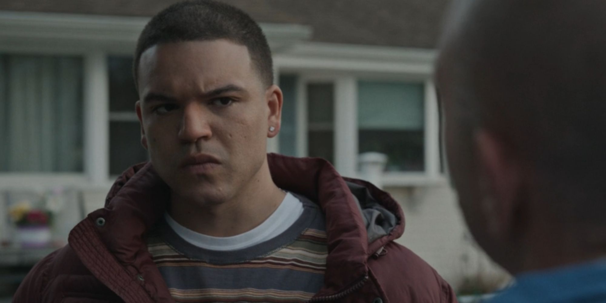 Josh Rivera looks annoyed as Aaron Hernandez in American Sports Story.