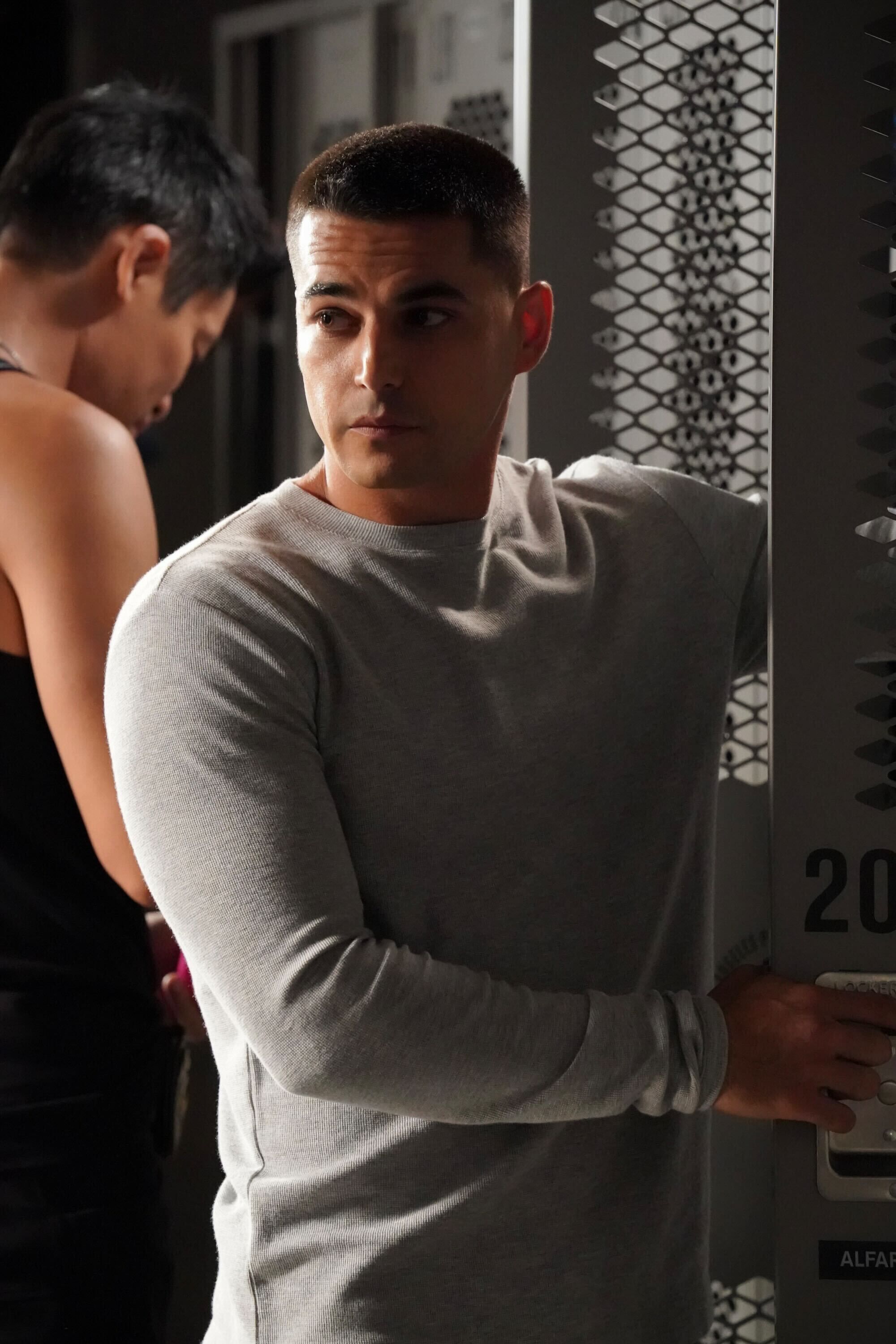 A member of SWAT in season 8, episode 1, standing by his locker