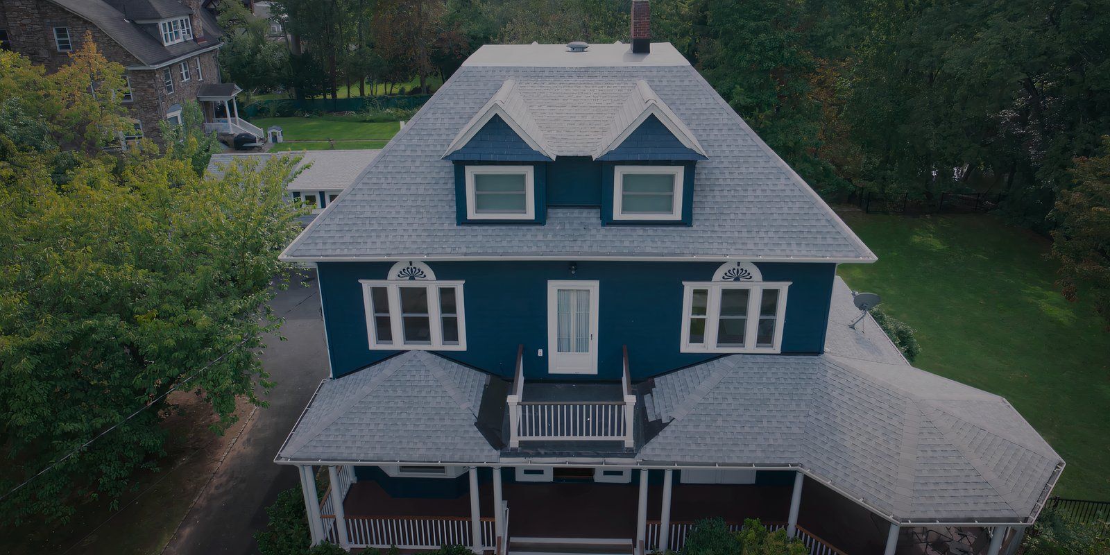 A suburban house from above in the Presence teaser