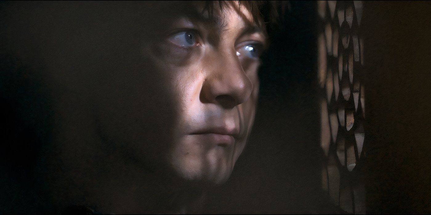 A young man looks through a vent in Misericordia