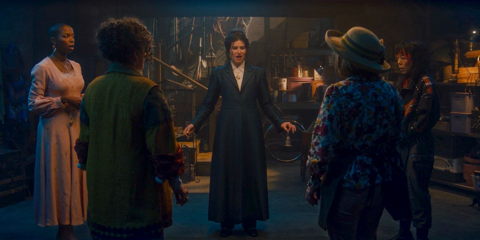 Agatha Harkness (Kathryn Hahn) and the coven chanting to open the witches' Road in Agatha All Along Season 1 Episode 2