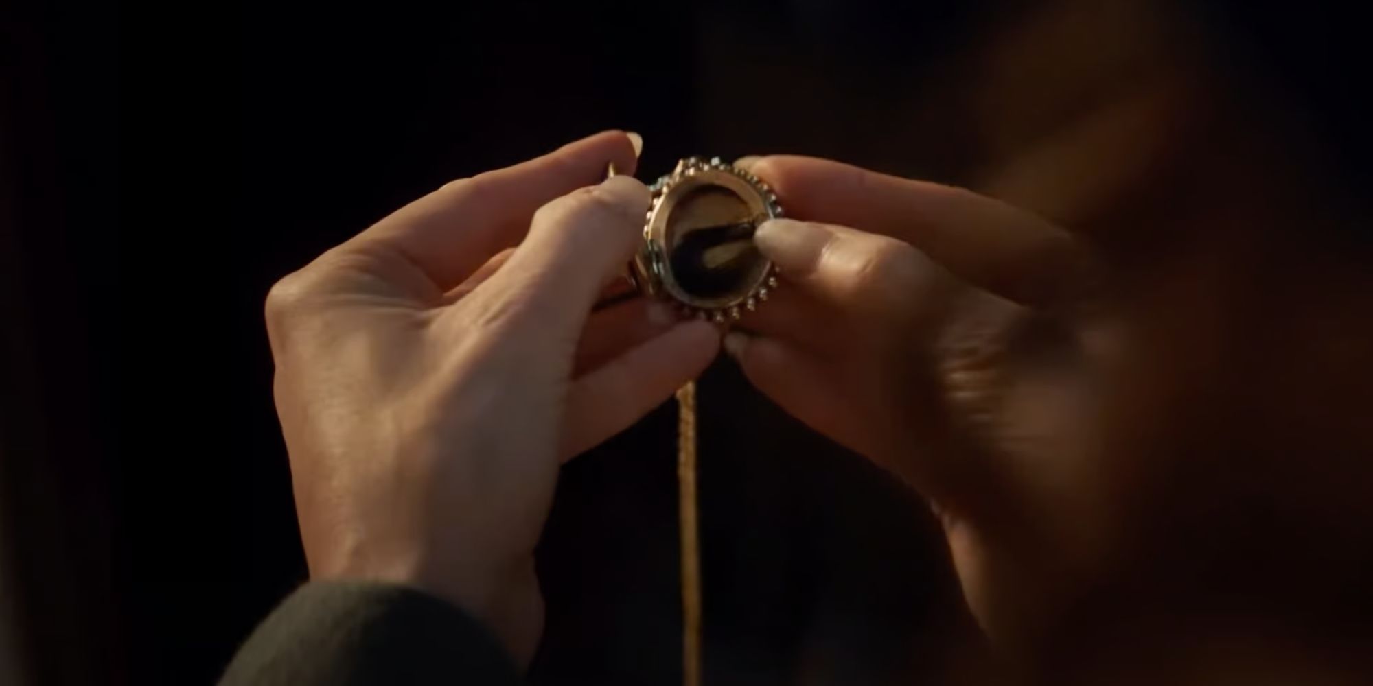 Agatha holds a locket with hair in it in Agatha All Along