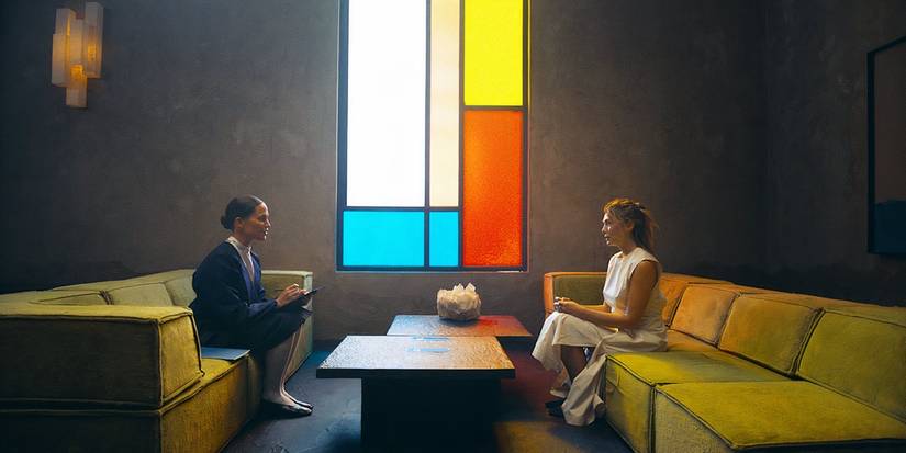 Alicia Vikander chats with Elizabeth Olsen in The Assessment still