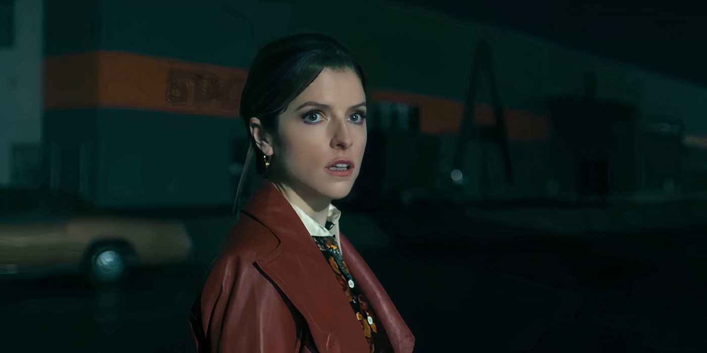 Anna Kendrick standing in a parking lot looking scared in Woman of the Hour