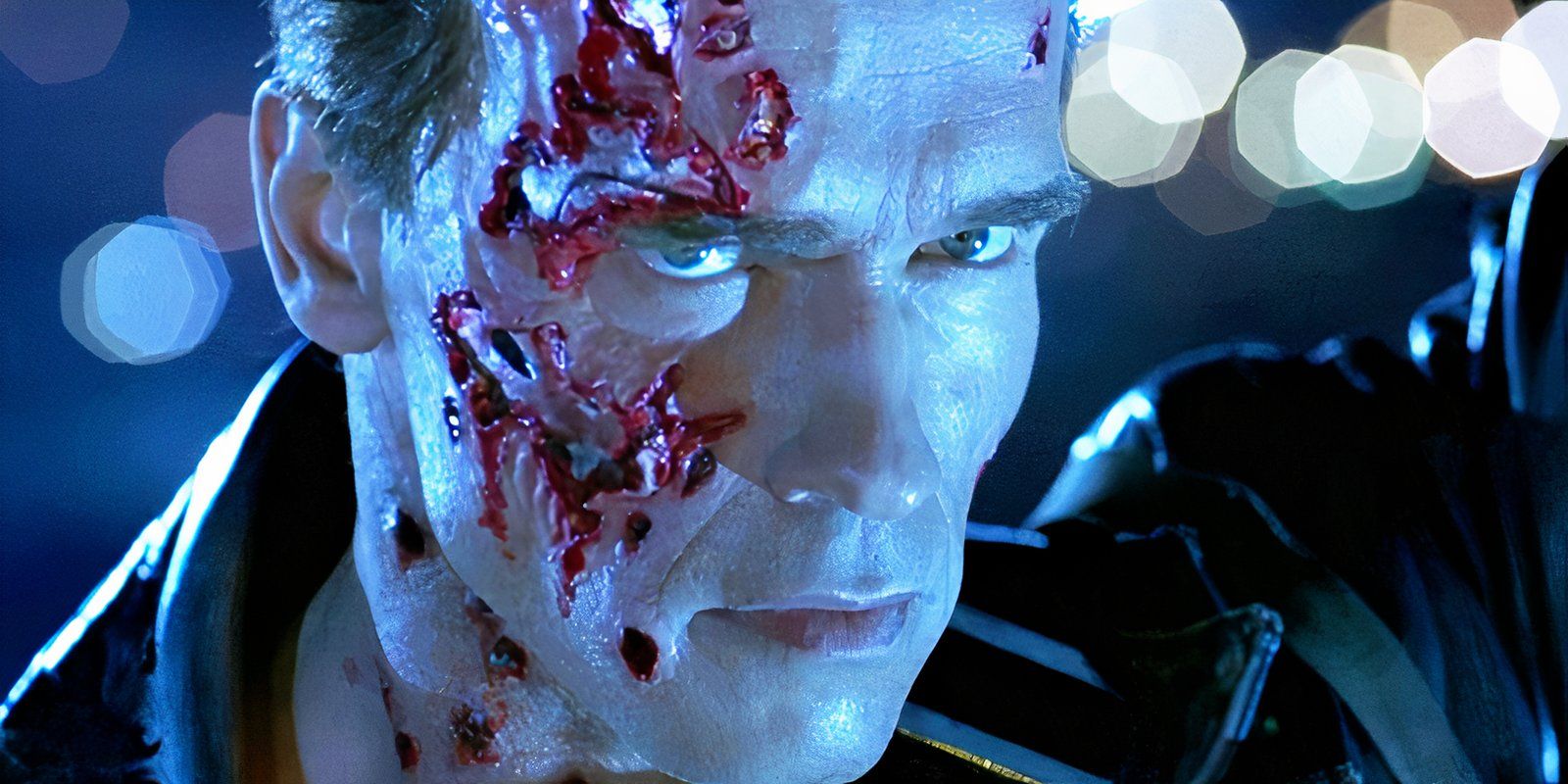 Arnold Schwarzenegger as the T-800 with a shredded face in Terminator 2 Judgment Day