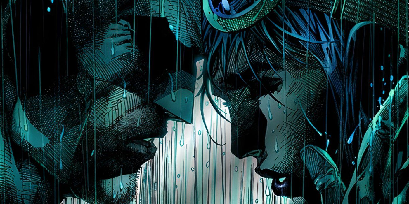 Comic book art: Batman holds Catwoman&rsquo;s face in the rain.