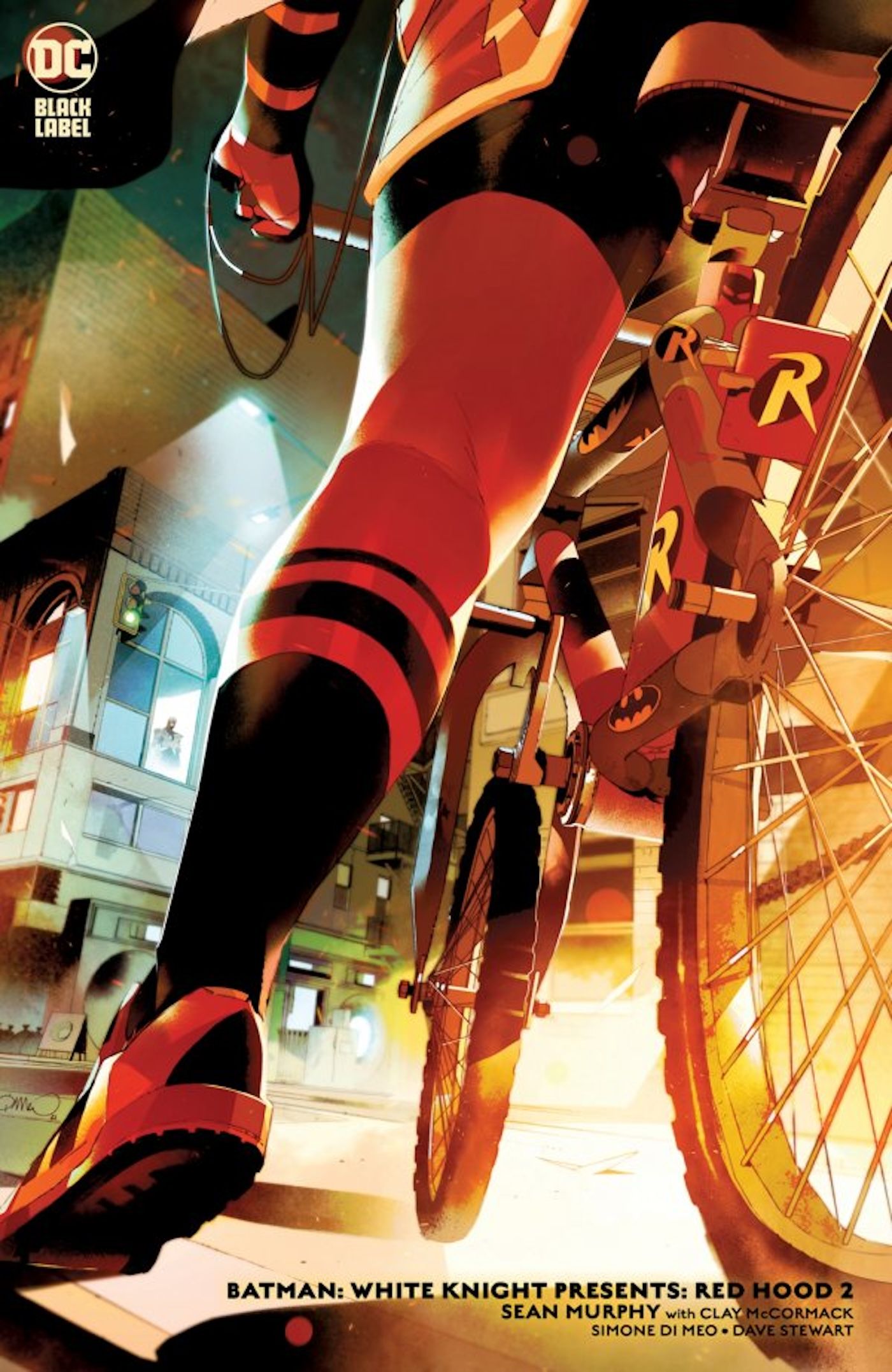 Comic book cover: Robin's leg stretches next to a bike with the Robin logo.