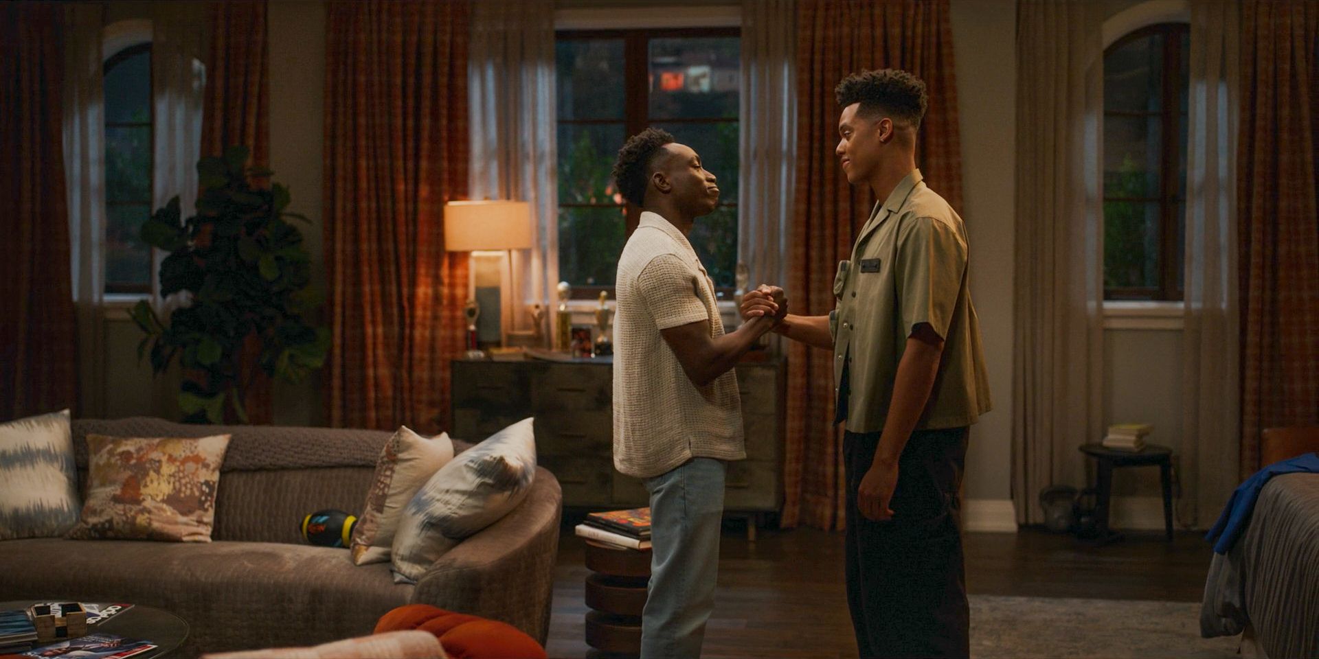 Carlton (Olly Sholotan) and Will (Jabari Banks) shake hands and wish each other luck in Bel-Air Season 3 Episode 6