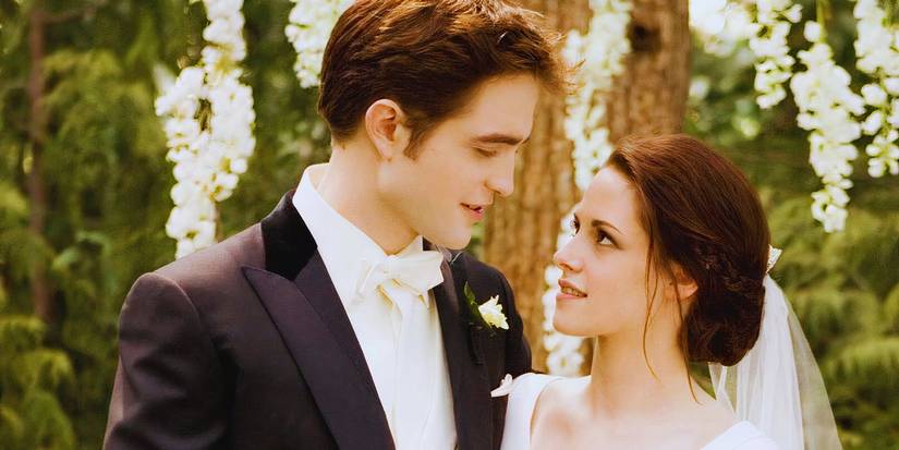 Bella, played by Kristen Stewart, and Edward, played by Robert Pattinson, getting married in Breaking Dawn