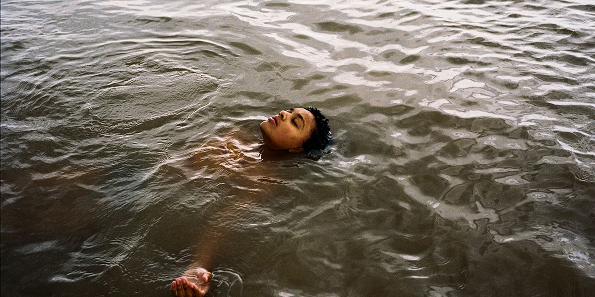 Nykiya Adams floats in the waters of Nyoni.