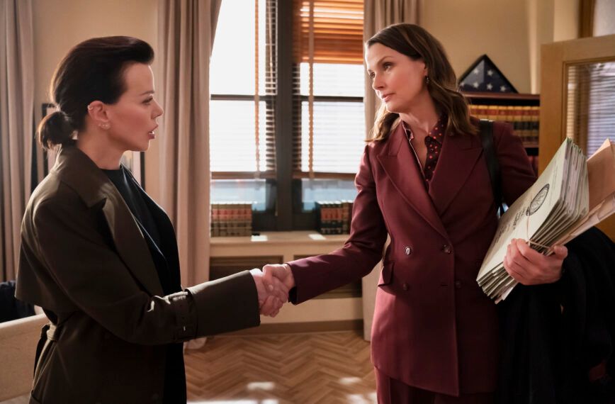 Blue Bloods season 14 two women shaking hands in police office 