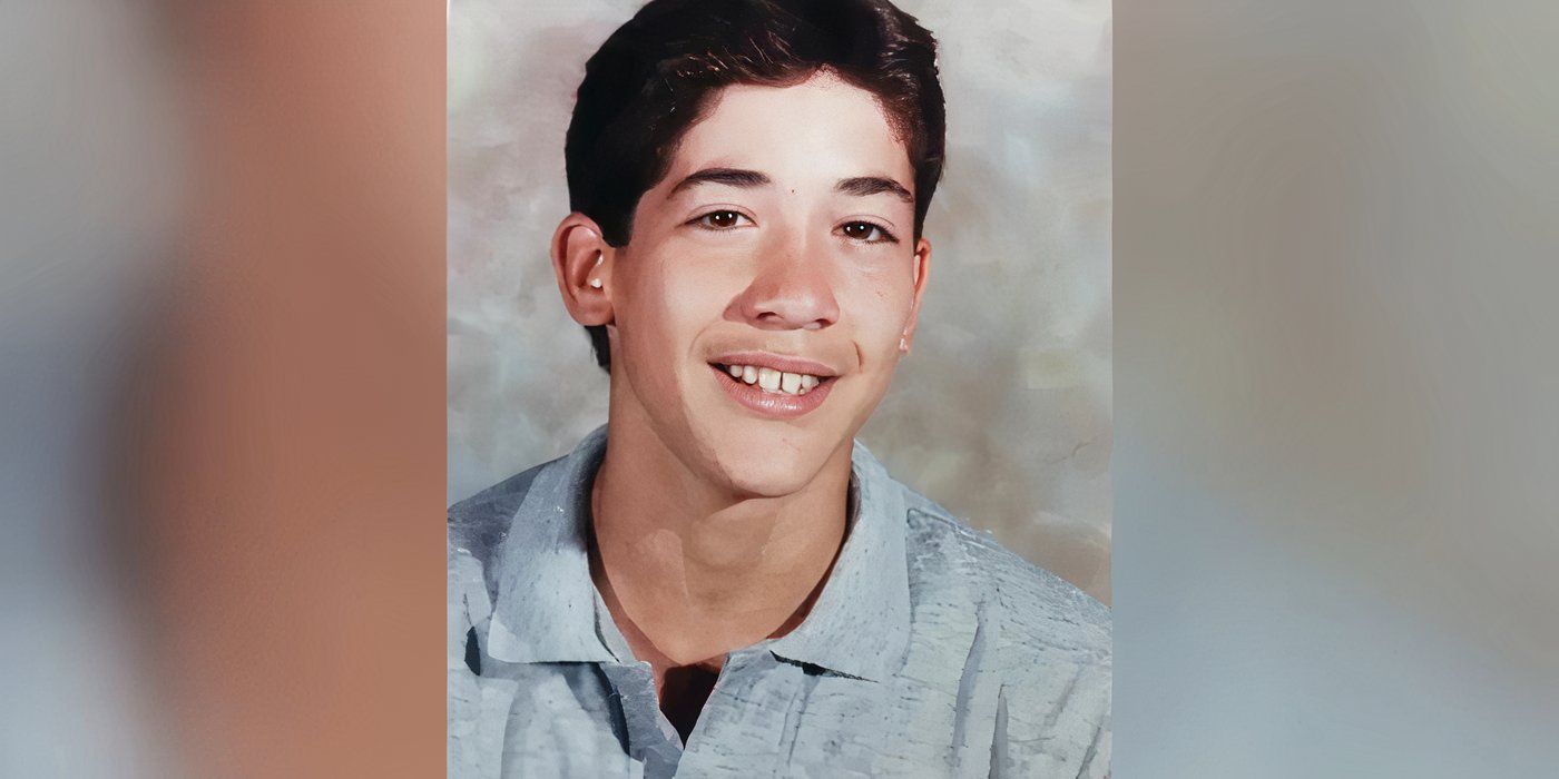 Brian Muniz in 90 Day Fiance throwback picture of him smiling in blue shirt