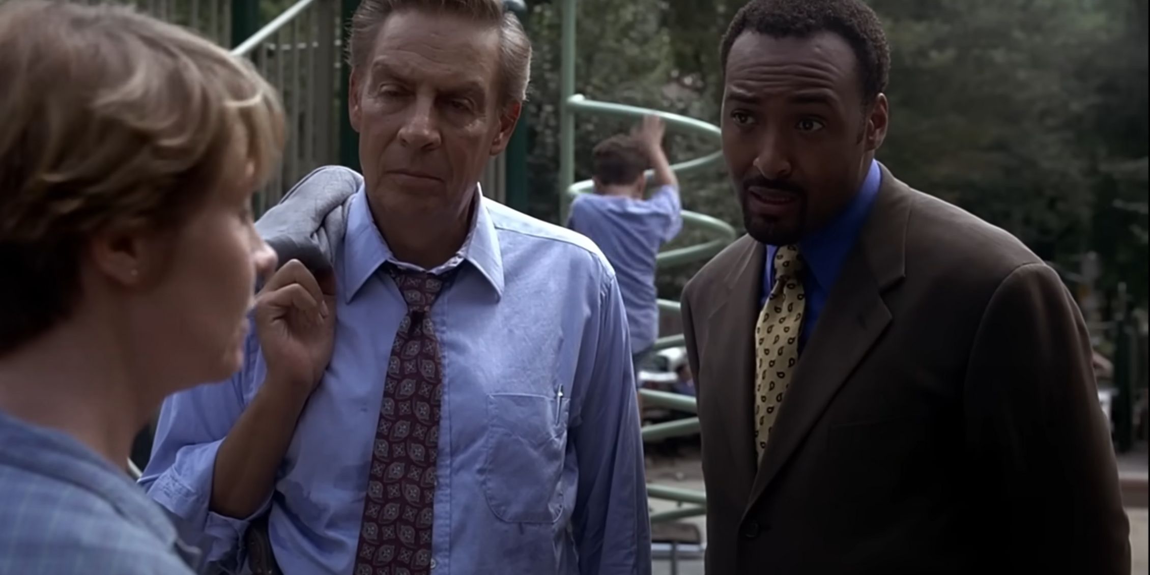 Law & Order's Briscoe and Green question A witness at a playground with kids playing on equipment in the background