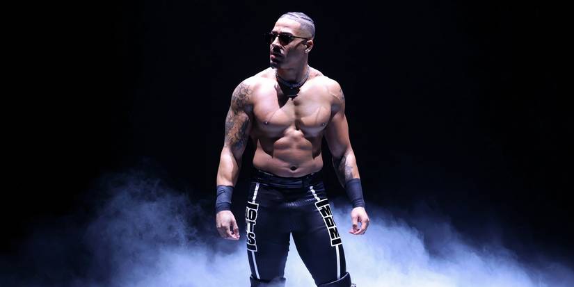 Carmelo Hayes makes his entrance to wrestle Andrade