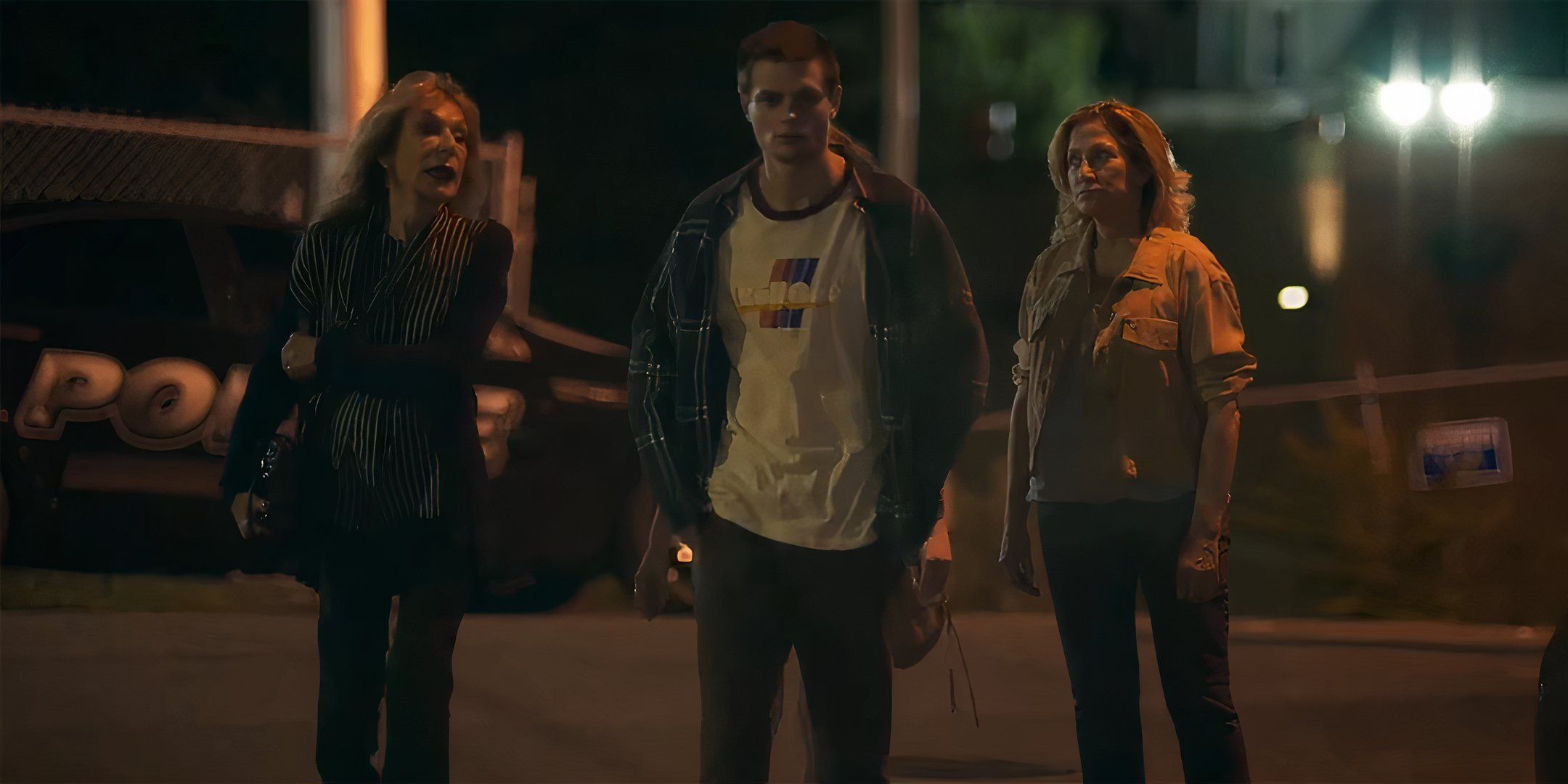 Charlie Tahan's Mark looking angry and walking away from Edie Falco's Wanda and her mom in I'll Be Right There