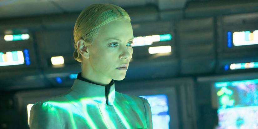 Charlize Theron looking at a screen in Prometheus